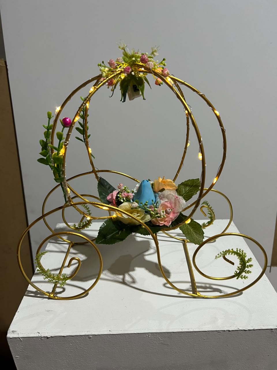 Carruaje de flores pastel